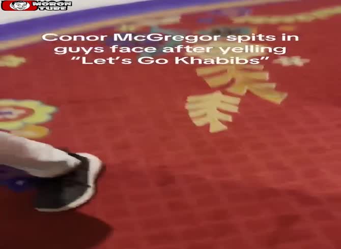 Video :When a fan agitates him in public, McGregor spits at them